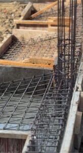 Footing reinforcement with rebar mesh and column steel in shuttering